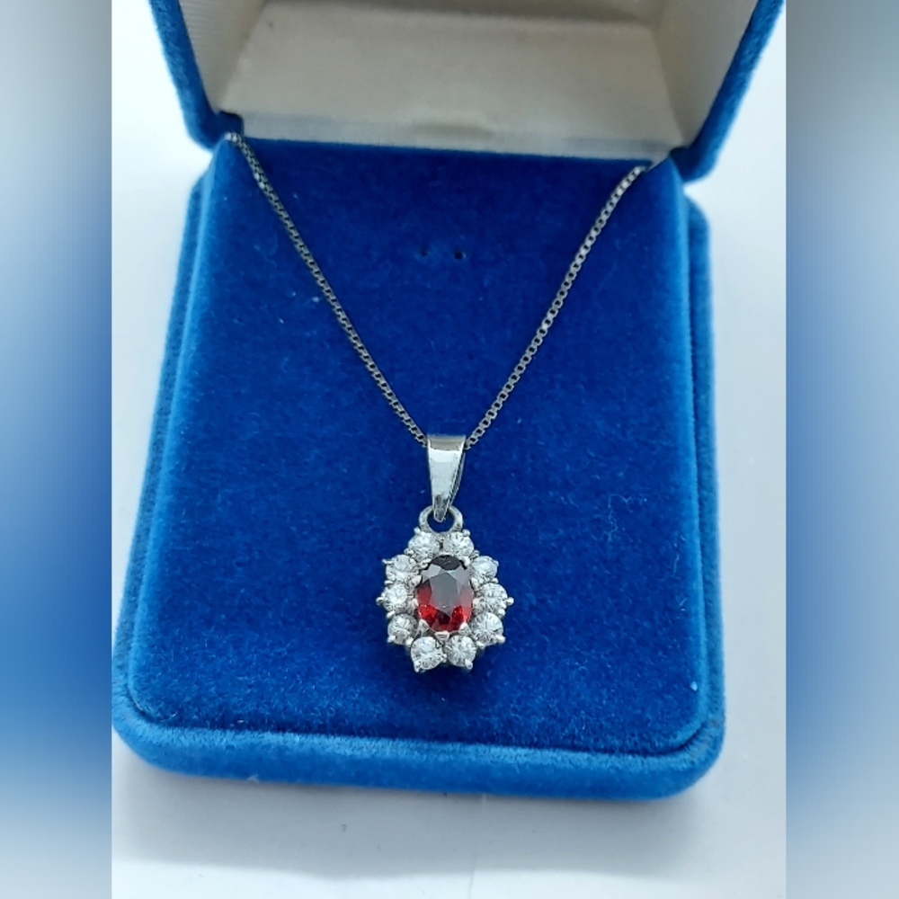 Elegant Silver and Red Gemstone Pendant Necklace